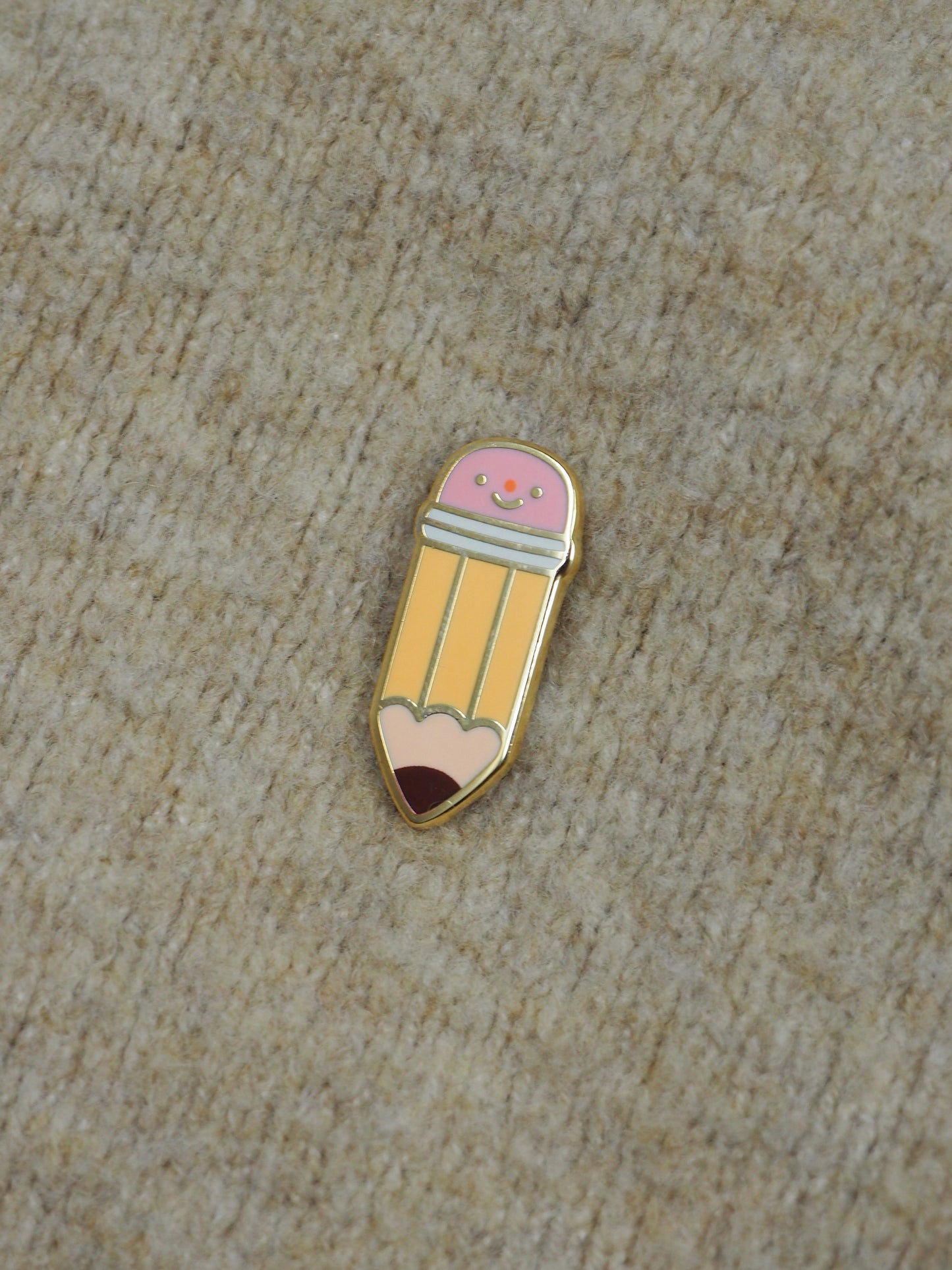 graphite pencil • enamel pin