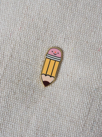 graphite pencil • enamel pin