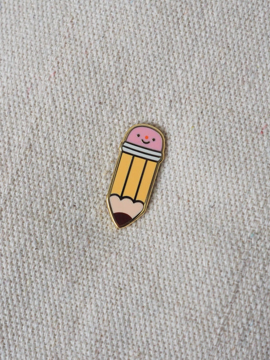 graphite pencil • enamel pin